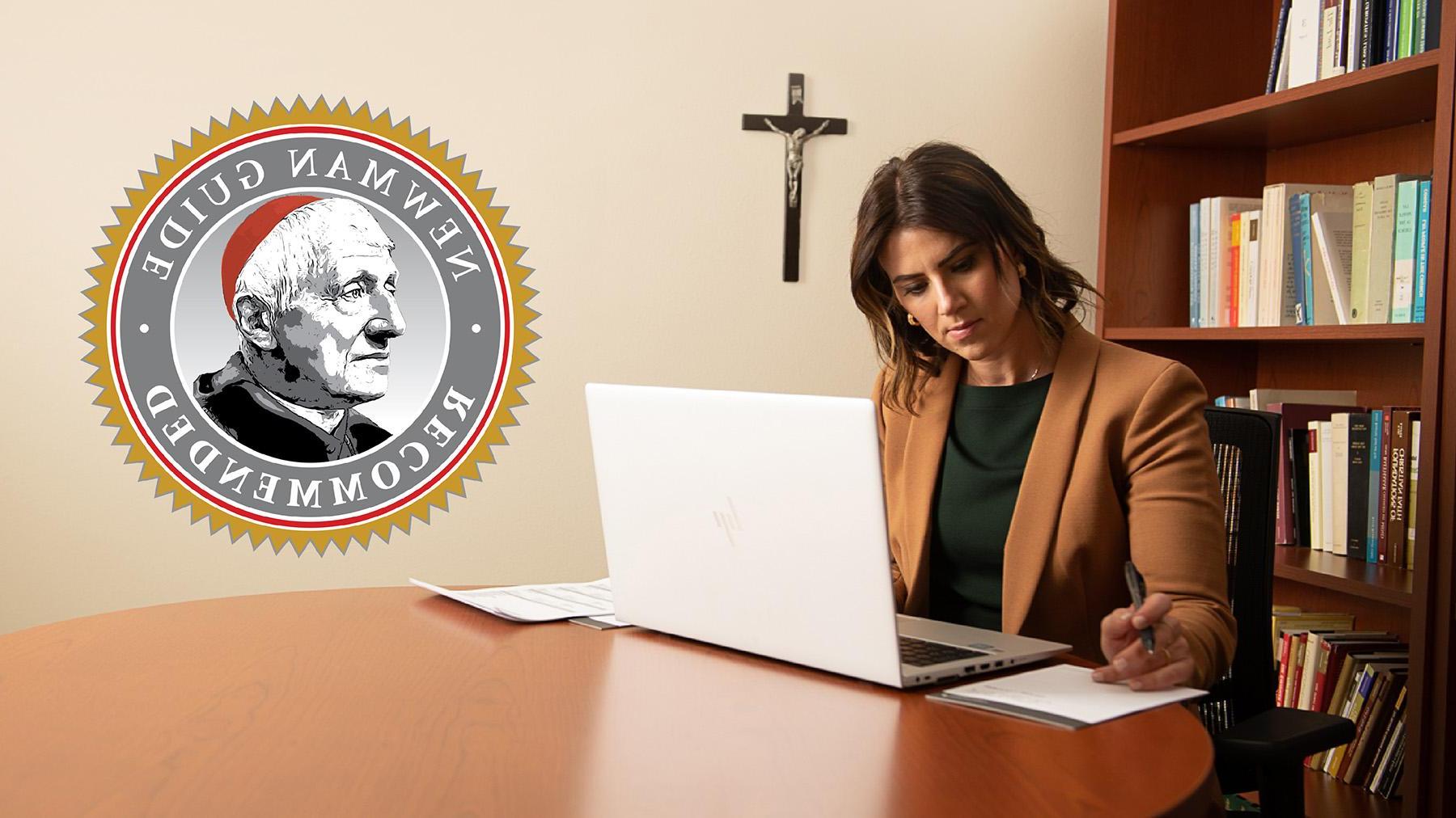 woman writing with a laptop open and the Newman Guide Seal to the right.